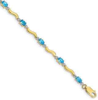 7" 10k Yellow Gold Fancy Diamond and Blue Topaz Bracelet