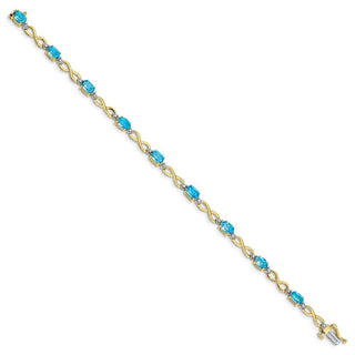 7" 10k Yellow Gold Blue Topaz and Diamond Infinity Bracelet