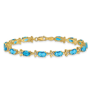 7" 14k Yellow Gold Floral Diamond and Blue Topaz Bracelet