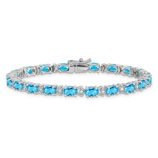 7" 14k White Gold Oval Blue Topaz and Diamond Bracelet