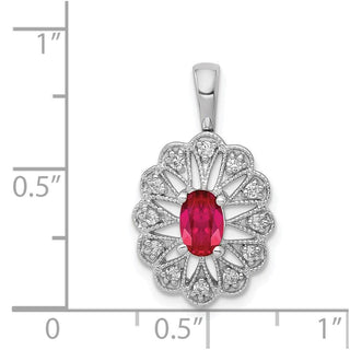 14k White Gold 1/6ctw Diamond And .70Ctw Ruby Fancy Pendant