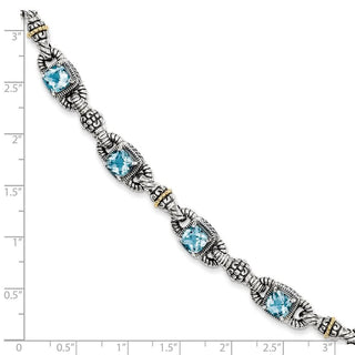 7.25" Sterling Silver & 14k Yellow Gold Sky Blue Topaz Bracelet