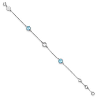 7.25" Sterling Silver White Ice Blue Topaz Station and .05ctw Diamond Bracelet