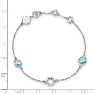 7.25" Sterling Silver White Ice Blue Topaz Station and .05ctw Diamond Bracelet