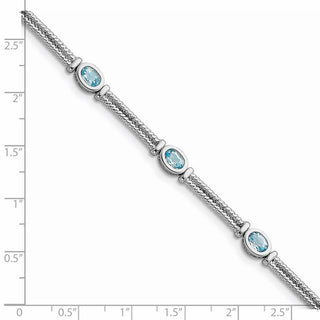 7" Sterling Silver Rhodium-plated Blue Topaz Bracelet QX601BT