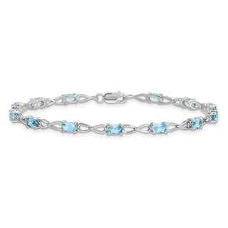 7" Sterling Silver Rhodium-plated Blue Topaz Bracelet QX842BT