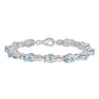 7" Sterling Silver Rhodium-plated Blue Topaz Bracelet QX864BT