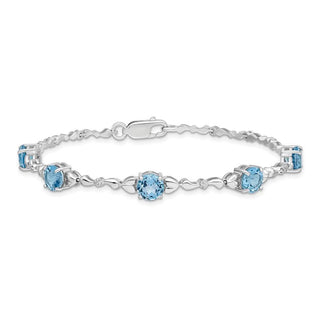 7.5" Sterling Silver Rhodium-plated Light Swiss Blue Topaz & Diamond Bracelet