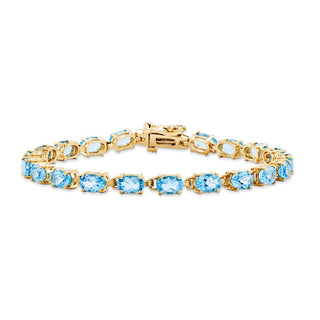 7" 14k Yellow Gold 6x4mm Oval Blue Topaz Bracelet X960BT